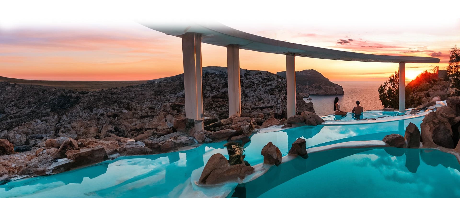 A pool with rocks and water in it